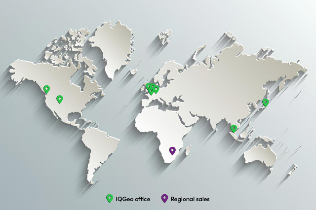 IQGeoのオフィス所在地を示す緑色のピンと、地域営業拠点を示す紫色のピンが付いた世界地図